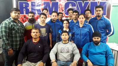 Selected Bench-press Powerlifting State team posing for a group photograph. Selected Bench-press Powerlifting State team posing for a group photograph.