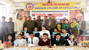 Winners of Debate Competition posing for a group photograph alongwith chief guest and other dignitaries at Shivalik Public School in Udhampur. Winners of Debate Competition posing for a group photograph alongwith chief guest and other dignitaries at Shivalik Public School in Udhampur.