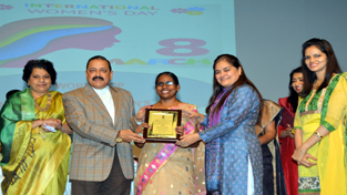 Union Minister Dr Jitendra Singh felicitating India’s first totally visually impaired Indian Foreign Service (IFS) officer Beno Zefine on the occasion of International Women’s Day, at New Delhi on Tuesday. Union Minister Dr Jitendra Singh felicitating India’s first totally visually impaired Indian Foreign Service (IFS) officer Beno Zefine on the occasion of International Women’s Day, at New Delhi on Tuesday.