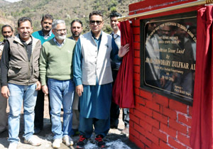 Former Minister Ch Zulfkar laying foundation stone of road. Former Minister Ch Zulfkar laying foundation stone of road.