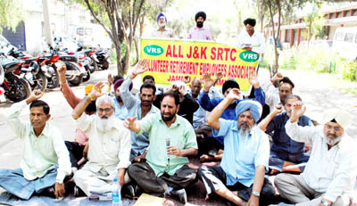 VRS given SRTC employees staging protest dharna near Press Club in Jammu on Monday. -Excelsior/Rakesh VRS given SRTC employees staging protest dharna near Press Club in Jammu on Monday. -Excelsior/Rakesh