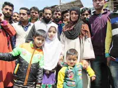People stage protest against the disappearance of a man in Punjab, at Kupwara on Friday. -Excelsior/ Aabid Nabi People stage protest against the disappearance of a man in Punjab, at Kupwara on Friday. -Excelsior/ Aabid Nabi