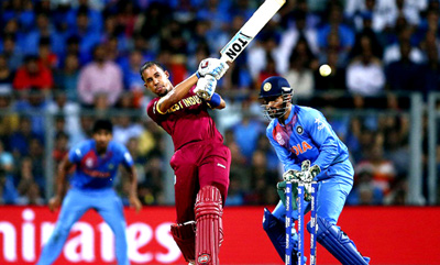 Lendl Simmons hits the ball through midwicket in World T20 semis against India at Mumbai on Thursday.