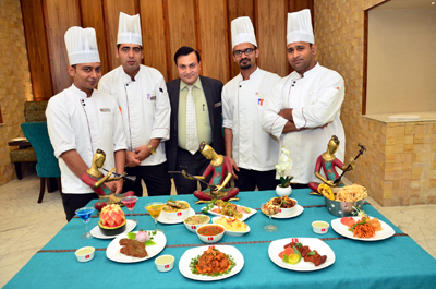 Chefs of Blue Coriander along with GM of the Lords Inn displaying Kashmiri cuisine, as food fest started on Thursday in the restaurant. Chefs of Blue Coriander along with GM of the Lords Inn displaying Kashmiri cuisine, as food fest started on Thursday in the restaurant.