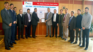 J&K Bank’s Executive President Vagish Chander presenting ‘Certificate of Registration’ to Chairman & CEO J&K Bank Mushtaq Ahmed. J&K Bank’s Executive President Vagish Chander presenting ‘Certificate of Registration’ to Chairman & CEO J&K Bank Mushtaq Ahmed.