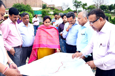 MoS for Education, Priya Sethi having a look on map during visit to Bagh-e-Bahu Park on Tuesday. MoS for Education, Priya Sethi having a look on map during visit to Bagh-e-Bahu Park on Tuesday.