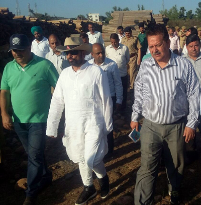 Minister for Forests, Choudhary Lal Singh during inspection of open land of Forest Department at Sunjwan on Friday. Minister for Forests, Choudhary Lal Singh during inspection of open land of Forest Department at Sunjwan on Friday.