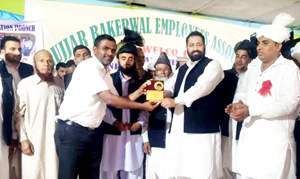 Gujjar Scholar being honoured at Poonch on Monday. Gujjar Scholar being honoured at Poonch on Monday.