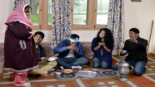 Bollywood film stars playing the role of Kashmiris during the shooting of ‘Sargoshiya’ movie in a hotel at Tangmarg. —Excelsior/Aabid Nabi Bollywood film stars playing the role of Kashmiris during the shooting of ‘Sargoshiya’ movie in a hotel at Tangmarg. —Excelsior/Aabid Nabi