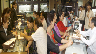 Women purchasing gold ornaments on the occasion of Akshaya Tritya, the third (Lunar day) of Shukla Paksha, which is considered very pious day in Hindu religion as on this very day Holy Ganga had descended on earth from heaven. It is also the birthday of Lord Parshuram, the sixth incarnation of Lord Vishnu. Maharishi Vyasa had also started writing Mahabharat on Akshaya Tritya. The jewellery shops are specially decorated for this day and the jewellers offer various discounts on gold and diamond jewellery. -Excelsior/Rakesh Women purchasing gold ornaments on the occasion of Akshaya Tritya, the third (Lunar day) of Shukla Paksha, which is considered very pious day in Hindu religion as on this very day Holy Ganga had descended on earth from heaven. It is also the birthday of Lord Parshuram, the sixth incarnation of Lord Vishnu. Maharishi Vyasa had also started writing Mahabharat on Akshaya Tritya. The jewellery shops are specially decorated for this day and the jewellers offer various discounts on gold and diamond jewellery. -Excelsior/Rakesh