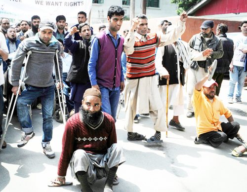 Members of JKHA shoutings during a protest in Srinagar on Tuesday. Members of JKHA shoutings during a protest in Srinagar on Tuesday.