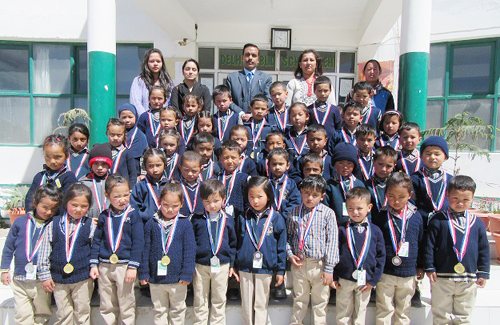Winners of kick-the-ball competition posing for group photograph. Winners of kick-the-ball competition posing for group photograph.