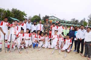 Winners posing alongwith dignitaries during valedictory function of Hockey Tournament organized by Army. Winners posing alongwith dignitaries during valedictory function of Hockey Tournament organized by Army.