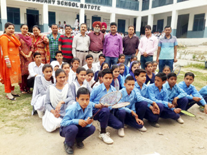 Winners of Inter-School Badminton Tournament posing for a group photograph alongwith Principal Govt HSS Batote on Tuesday. Winners of Inter-School Badminton Tournament posing for a group photograph alongwith Principal Govt HSS Batote on Tuesday.
