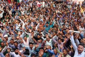 PHE daily rated workers sitting on protest dharna at BC Road PHE complex in Jammu on Monday. —Excelsior/ Rakesh PHE daily rated workers sitting on protest dharna at BC Road PHE complex in Jammu on Monday. —Excelsior/ Rakesh