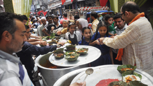Prasad being served to devotees at old Bhairav Nath Temple, Chowk Chabutra in Jammu. Prasad being served to devotees at old Bhairav Nath Temple, Chowk Chabutra in Jammu.
