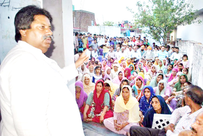 Cong leader Raman Bhalla addressing public meeting at Bhour Camp in Jammu on Thursday. Cong leader Raman Bhalla addressing public meeting at Bhour Camp in Jammu on Thursday.