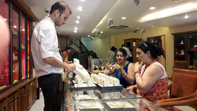 Customers busy in shopping at Tanishq store at Jammu. Customers busy in shopping at Tanishq store at Jammu.