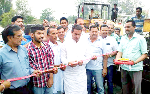 MLA Rajiv Jasrotia kick starting black topping of road at Kathua on Tuesday. MLA Rajiv Jasrotia kick starting black topping of road at Kathua on Tuesday.