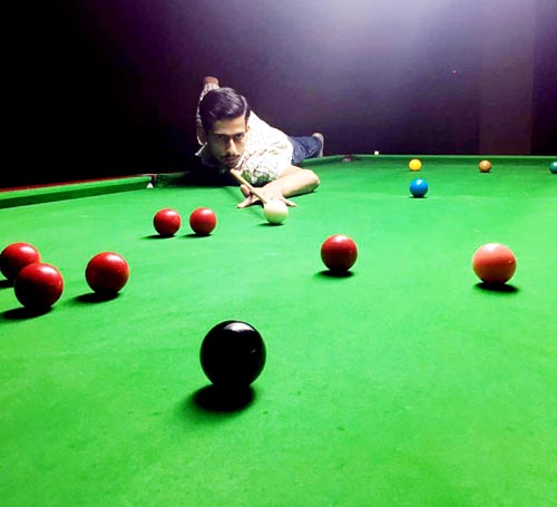 Abhishek Pathania aiming at target during first semis of Six Red Ball Tournament at Billiards Hall, MA Stadium on Thursday. Abhishek Pathania aiming at target during first semis of Six Red Ball Tournament at Billiards Hall, MA Stadium on Thursday.