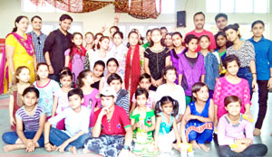 Participants of music workshop posing for group photograph. Participants of music workshop posing for group photograph.