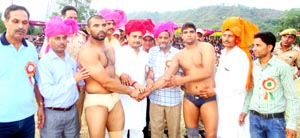 MLA Ramnagar R S Pathania and Shiv Kumar Sharma inaugurating 111th Annual Thial-Chougan Dangal at Sunal, district Udhampur. MLA Ramnagar R S Pathania and Shiv Kumar Sharma inaugurating 111th Annual Thial-Chougan Dangal at Sunal, district Udhampur.