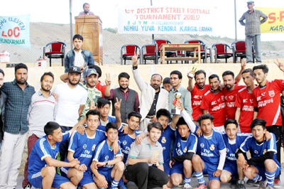 Winning team players posing for group photograph. Winning team players posing for group photograph.