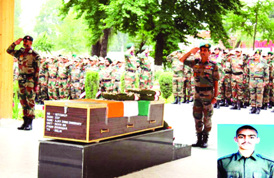 Tributes being paid to martyr Ajay Singh Choudhary at Badami Bagh Cantt in Srinagar on Thursday. -Excelsior/ Aabid Tributes being paid to martyr Ajay Singh Choudhary at Badami Bagh Cantt in Srinagar on Thursday. -Excelsior/ Aabid