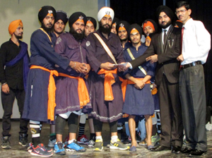 Sikh youth being felicitated during a function in Jammu on Sunday. —Excelsior/ Rakesh Sikh youth being felicitated during a function in Jammu on Sunday. —Excelsior/ Rakesh