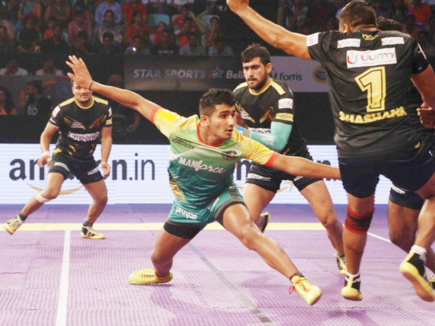 Players in action during a Pro-Kabaddi match at New Delhi. Players in action during a Pro-Kabaddi match at New Delhi.