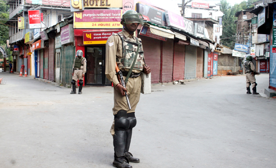 Para-military personnel guard Court Road in Lal Chowk area of Srinagar on Wednesday. —Excelsior/Shakeel Para-military personnel guard Court Road in Lal Chowk area of Srinagar on Wednesday. —Excelsior/Shakeel