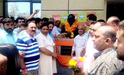 BJP leaders and workers paying tributes to Dr Shyama Prasad Mookherjee. BJP leaders and workers paying tributes to Dr Shyama Prasad Mookherjee.