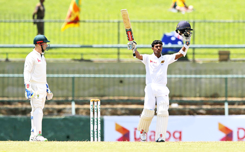 Kusal Mendis celebrating his century on 3rd day of Ist Test cricket match against Australia at Pallekele. Kusal Mendis celebrating his century on 3rd day of Ist Test cricket match against Australia at Pallekele.
