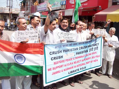 JWAM activists protesting against release of stone pelters at New Plot in Jammu on Wednesday. JWAM activists protesting against release of stone pelters at New Plot in Jammu on Wednesday.