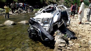 Ill-fated vehicle after accident at Rattan Bars in district Ramban. -Excelsior/Pervaiz Ill-fated vehicle after accident at Rattan Bars in district Ramban. -Excelsior/Pervaiz