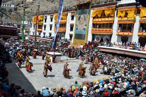 Huge gathering witnessing mask dance by monks during festival at Hemis Monastery near Leh on Thursday. -Excelsior/ Stanzin Huge gathering witnessing mask dance by monks during festival at Hemis Monastery near Leh on Thursday. -Excelsior/ Stanzin