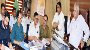 PHE Minister, Sham Lal Chaudhary chairing a meeting at Jammu on Tuesday. PHE Minister, Sham Lal Chaudhary chairing a meeting at Jammu on Tuesday.