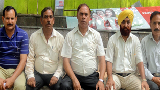 Members of SC/ST Employees Association holding meeting. Members of SC/ST Employees Association holding meeting.