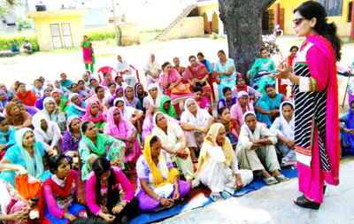 Congress leader Namrta Sharma addressing public meeting at Bishnah on Sunday. Congress leader Namrta Sharma addressing public meeting at Bishnah on Sunday.
