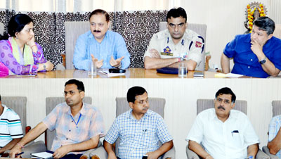 Divisional Commissioner, Dr Pawan Kotwal chairing a meeting at Jammu on Friday. Divisional Commissioner, Dr Pawan Kotwal chairing a meeting at Jammu on Friday.