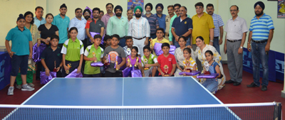 Winners in various categories of Table Tennis posing with their trophies. Winners in various categories of Table Tennis posing with their trophies.