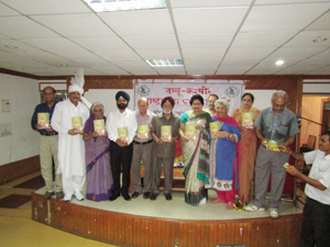 Dignitaries at a book release function. Dignitaries at a book release function.