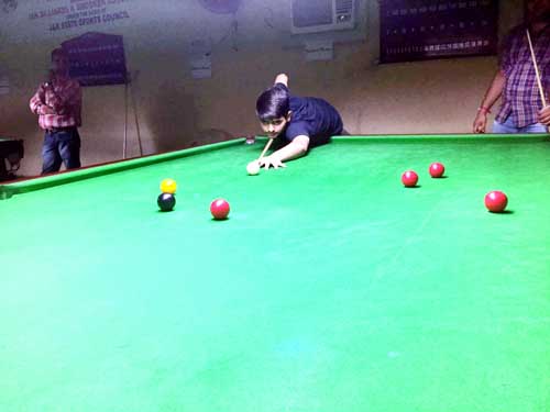 Furkan Wani aiming at target during his match against Sohail Khalid. Furkan Wani aiming at target during his match against Sohail Khalid.