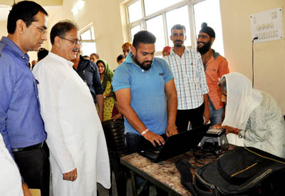 Speaker Legislative Assembly, Kavinder Gupta during his visit to a biometric enrolment camp at Satwari on Sunday. Speaker Legislative Assembly, Kavinder Gupta during his visit to a biometric enrolment camp at Satwari on Sunday.