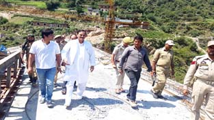 MLA Inderwal, G M Saroori inspecting construction work on Ganpat bridge at Doda. MLA Inderwal, G M Saroori inspecting construction work on Ganpat bridge at Doda.