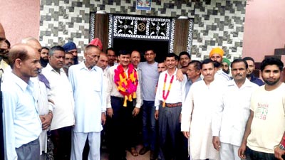MLC Vibodh Gupta posing with a gathering in Rajouri. MLC Vibodh Gupta posing with a gathering in Rajouri.