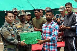 Army officers awarding winner of Wrestling Competition. Army officers awarding winner of Wrestling Competition.