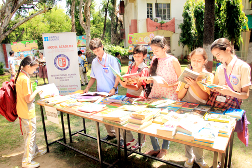 Students during book fair at Model Academy. Students during book fair at Model Academy.