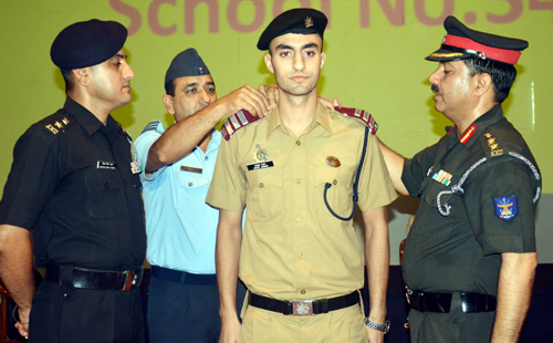 Dignitaries epauletting a cadet during investiture ceremony at Sainik School, Nagrota. Dignitaries epauletting a cadet during investiture ceremony at Sainik School, Nagrota.