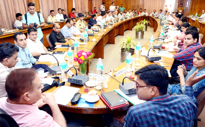 Divisional Commissioner, Dr Pawan Kotwal chairing a meeting at Katra on Monday. Divisional Commissioner, Dr Pawan Kotwal chairing a meeting at Katra on Monday.